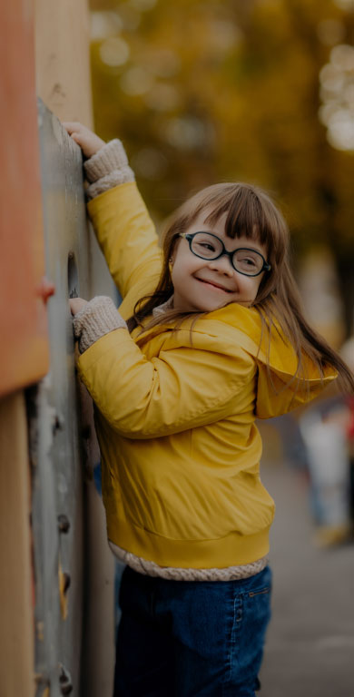 Girl with glasses, smiling