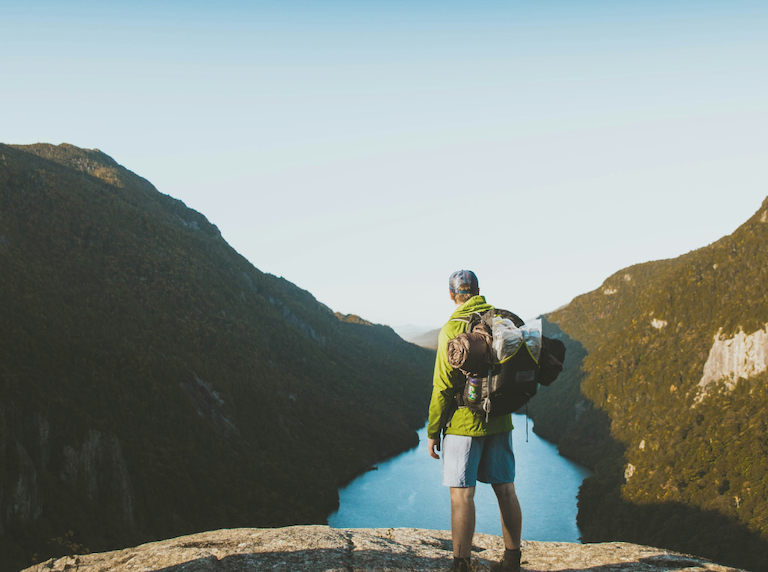 Hiker looking out over mountains